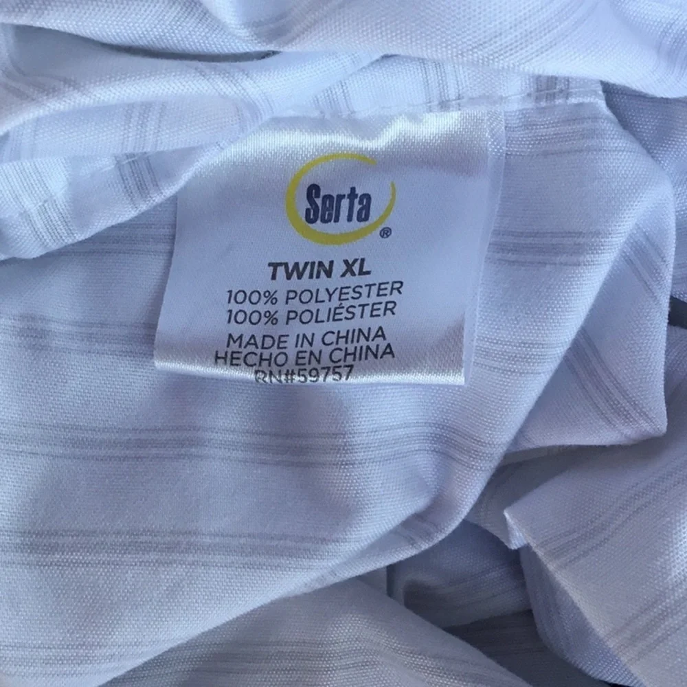 NWOT Serta set of two TXL sheets sets.